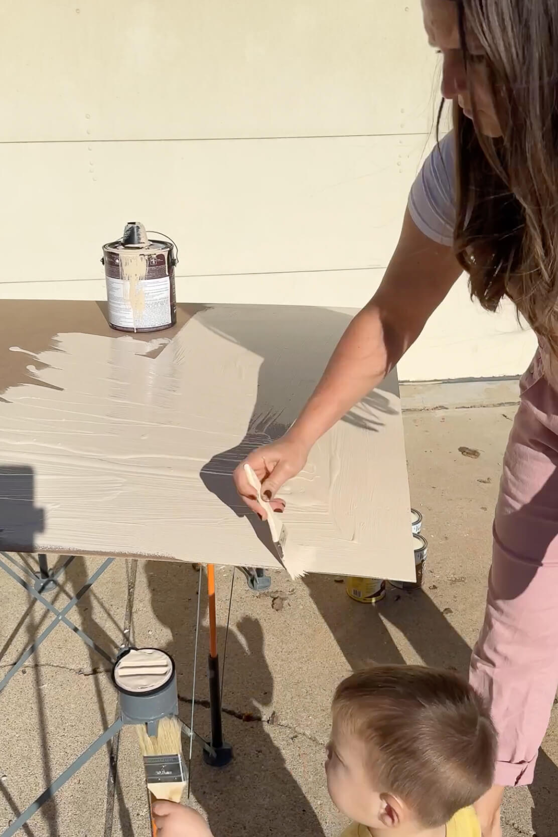 Painting a board to test stain colors out.